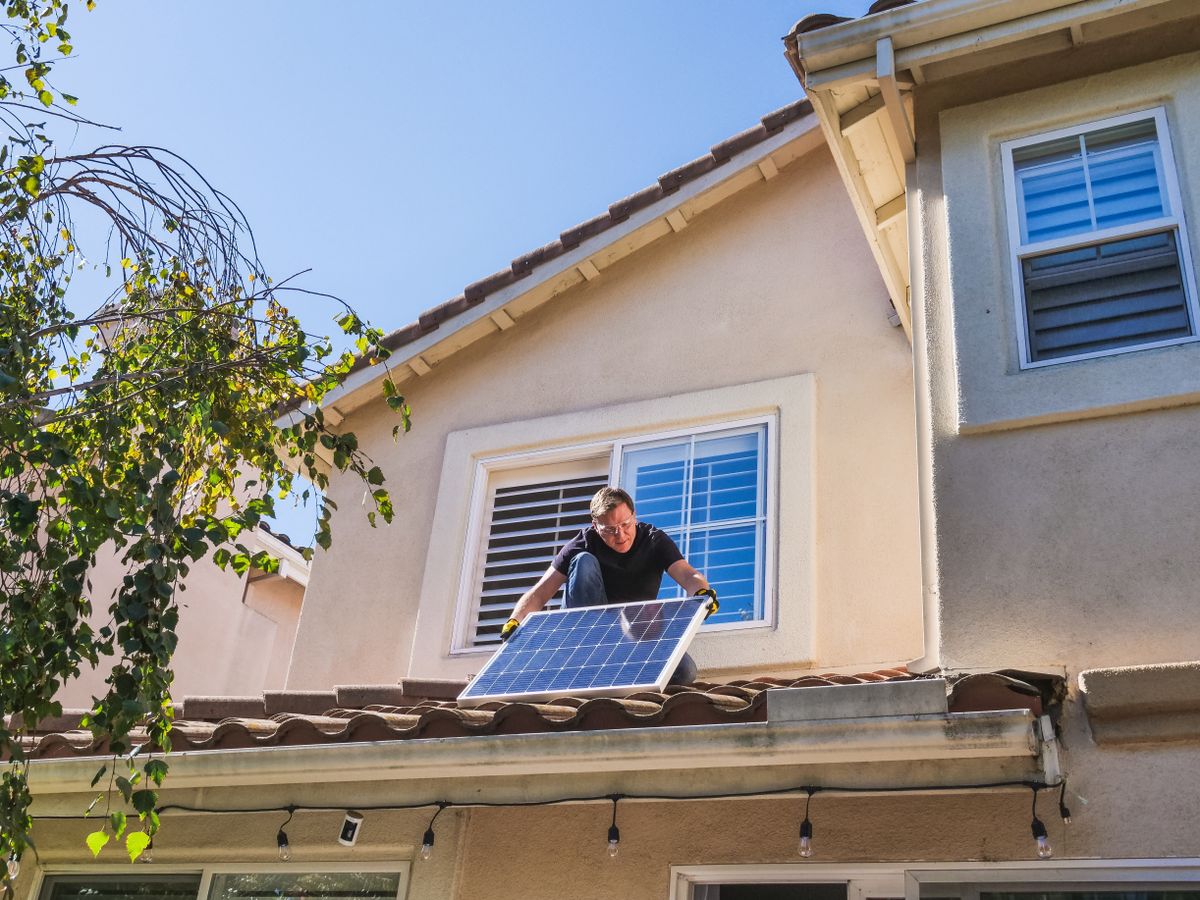 Crew installing solar modules