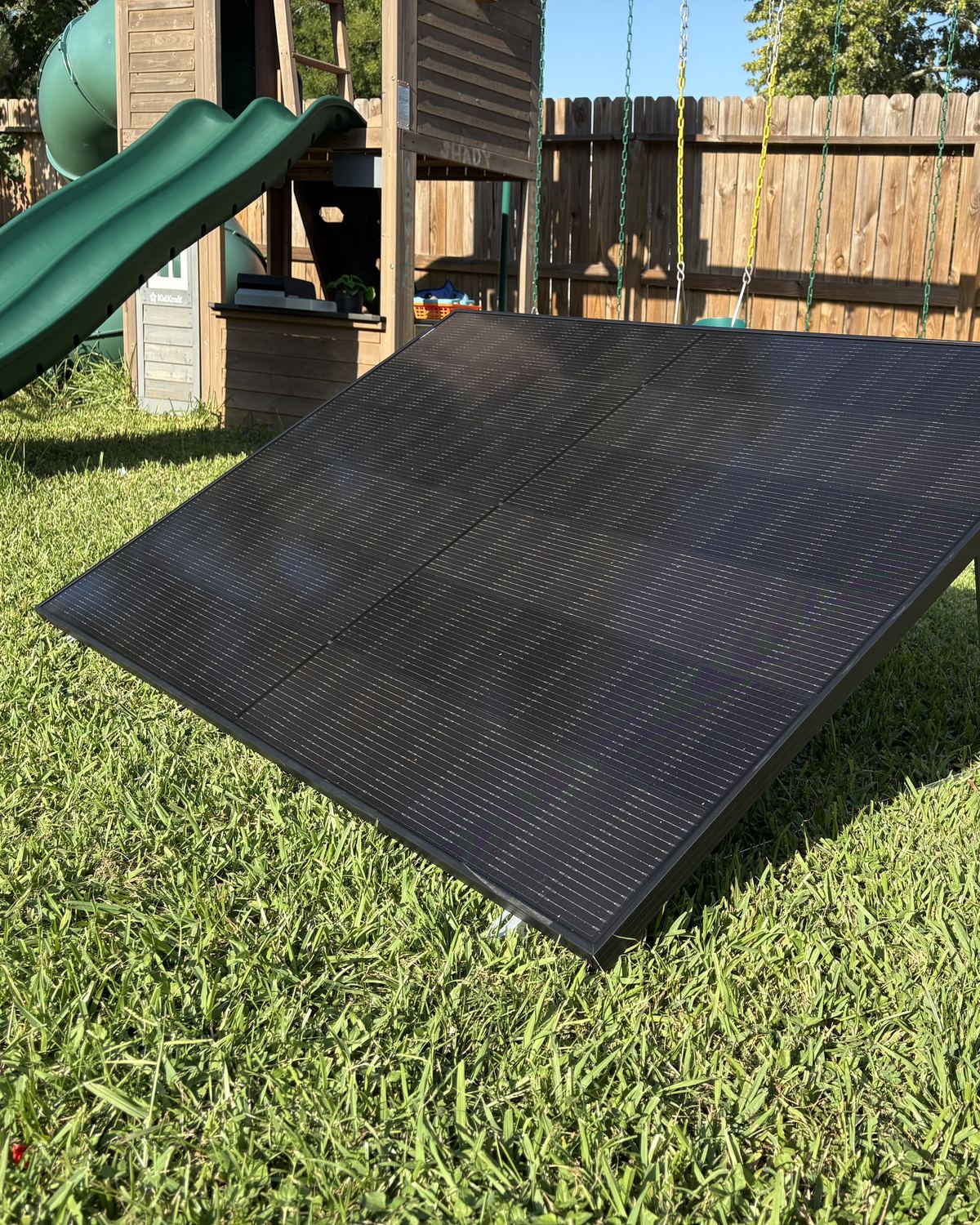 The 445W kit on its ground frame on a backyard lawn